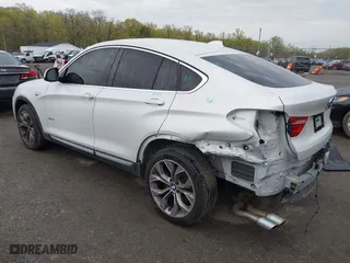 2018 BMW X4 xDrive28i with VIN 5UXXW3C57J0T82081, listed as a IAAI auction lot 41991254 with 100,654 mi miles. Bid and sale history available at carsss.com. Image 3.