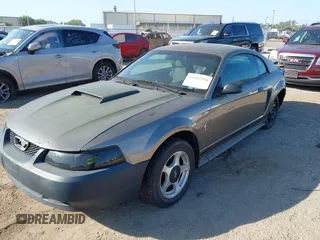 2001 Ford Mustang Standard with VIN 1FAFP40461F264327, listed as a IAAI auction lot 42002990 with 316,107 mi miles. Bid and sale history available at carsss.com. Image 16.