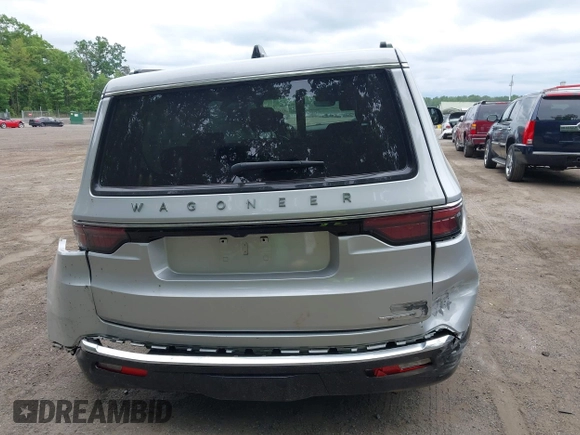 2024 Jeep Wagoneer Series III z VIN 1C4SJVDP8RS171557, wystawiony jako IAAI lot #42238821 z przebiegiem 32 827 mil mil oraz . Historia ofert i sprzedaży dostępna na DreamBid. Obrazek 16.