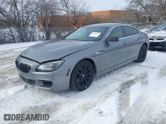 2013 BMW 6 Series 650i xDrive with VIN WBA6B4C54DDG67543, listed as a IAAI auction lot 41607681 with 74,101 mi miles. Bid and sale history available at carsss.com. Image 2.