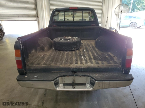 1997 Toyota Tacoma with VIN 4TAVL52N5VZ256443, listed as a Copart auction lot 57880284 with 133,989 mi miles and Clean Title. Bid and sale history available at carsss.com. Image 6.