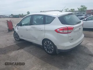 2017 Ford C-Max Titanium z VIN 1FADP5FU1HL100046, wystawiony jako IAAI lot #42356813 z przebiegiem 57 737 mil mil oraz . Historia ofert i sprzedaży dostępna na DreamBid. Obrazek 3.