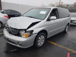 2003 Honda Odyssey EX with VIN 5FNRL18603B149365, listed as a IAAI auction lot 41108540 with 226,087 mi miles. Bid and sale history available at carsss.com. Image 2.