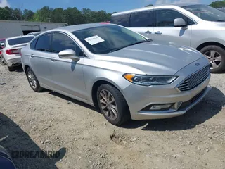 2017 Ford Fusion SE z VIN 3FA6P0HDXHR238713, wystawiony jako IAAI lot #42304140 z przebiegiem 157 630 mil mil oraz . Historia ofert i sprzedaży dostępna na DreamBid. Obrazek 1.
