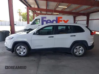 2015 Jeep Cherokee Sport z VIN 1C4PJLAB5FW560342, wystawiony jako IAAI lot #42422292 z przebiegiem 117 916 mil mil oraz . Historia ofert i sprzedaży dostępna na DreamBid. Obrazek 14.