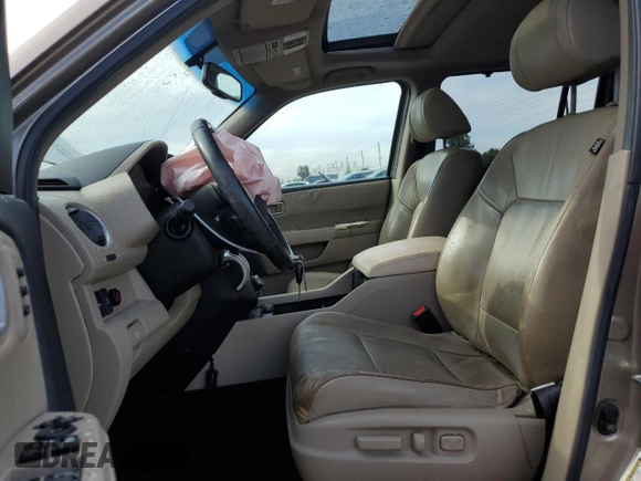 2010 Honda Pilot Touring with VIN 5FNYF3H81AB016255, listed as a Copart auction lot 71052644 with 96,847 mi miles and Salvage Title. Bid and sale history available at DreamBid. Image 7.