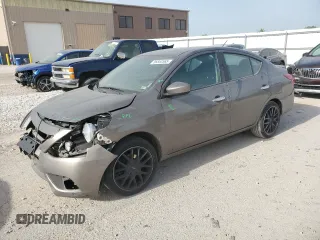 2016 Nissan Versa SV with VIN 3N1CN7AP9GL810018, listed as a Copart auction lot 56853565 with 123,197 mi miles and Salvage title. Bid and sale history available at DreamBid. Image 1.
