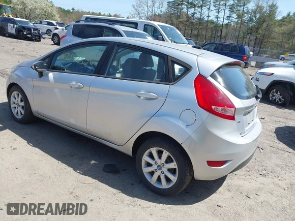 2013 Ford Fiesta SE with VIN 3FADP4EJ3DM136332, listed as a IAAI auction lot 42142556 with 69,979 mi miles and . Bid and sale history available at DreamBid. Image 3.