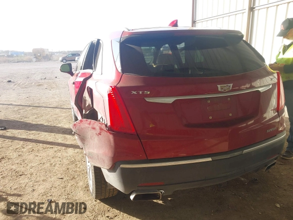 2019 Cadillac XT5 Premium Luxury FWD z VIN 1GYKNERS0KZ157287, wystawiony jako IAAI lot #41106524 z przebiegiem 131 464 mil mil oraz . Historia ofert i sprzedaży dostępna na DreamBid. Obrazek 3.
