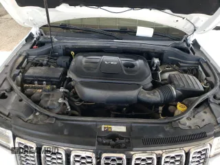 2018 Jeep Grand Cherokee Overland z VIN 1C4RJFCG4JC425589, wystawiony jako Copart lot #61775775 z przebiegiem 102 040 mil mil oraz Szkoda całkowita • Salvage title. Historia ofert i sprzedaży dostępna na DreamBid. Obrazek 12.