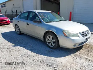 2002 Nissan Altima S with VIN 1N4AL11D12C166490, listed as a IAAI auction lot 42056634 with 203,367 mi miles. Bid and sale history available at carsss.com. Image 1.