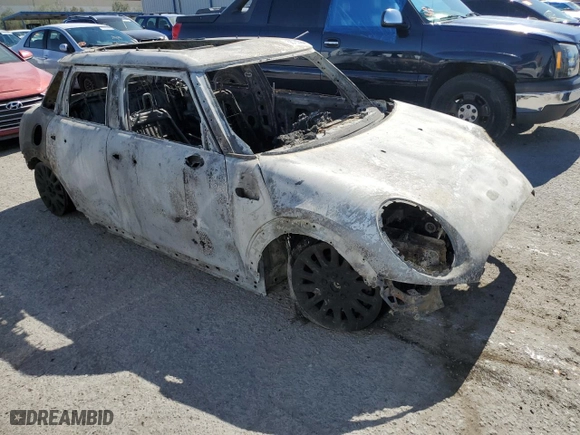 2015 MINI Cooper Hardtop 4 Door with VIN WMWXS5C59FT828730, listed as a Copart auction lot 74392614 with 0 mi miles and Non Repairable. Bid and sale history available at carsss.com. Image 4.