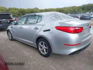 2014 Kia Optima LX with VIN 5XXGM4A71EG337837, listed as a IAAI auction lot 42251696 with 115,063 mi miles and . Bid and sale history available at DreamBid. Image 3.