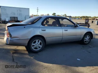 1995 Lexus ES 300 с VIN JT8GK13TXS0121401, выставлен на аукционе Copart как лот 74987404 с пробегом 90 900 миль миль и Списание • Salvage title. История ставок и продаж доступна на DreamBid. Изображение 3.
