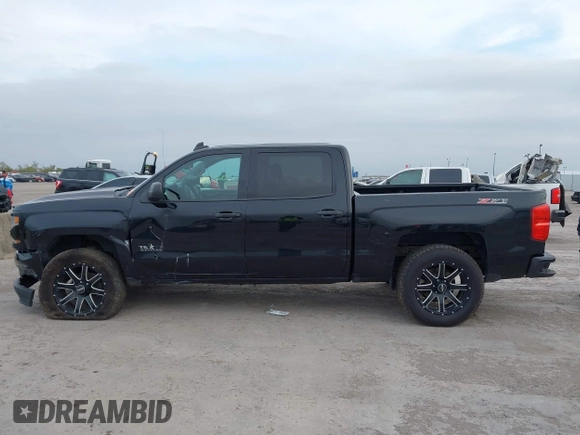 2017 Chevrolet Silverado 1500 LT with VIN 1GCUKREC2HF208232, listed as a IAAI auction lot 40933445 with 105,928 mi miles and . Bid and sale history available at DreamBid. Image 14.