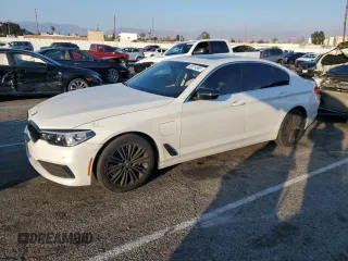 2019 BMW 5 Series 530e iPerformance with VIN WBAJA9C55KB389784, listed as a Copart auction lot 43014965 with 65,744 mi miles and Salvage Title. Bid and sale history available at carsss.com. Image 1.