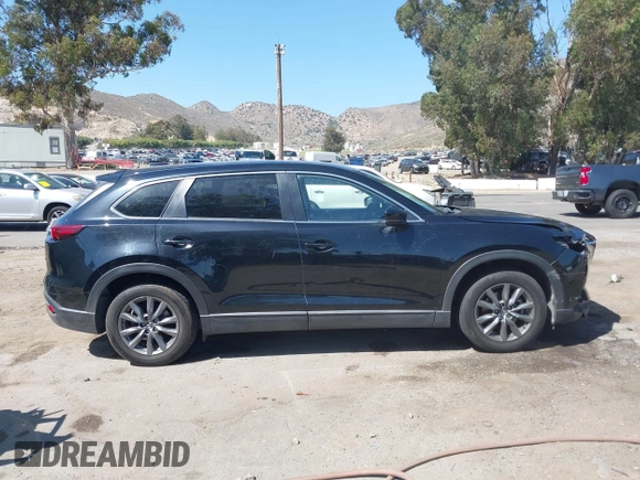 2020 Mazda CX-9 Sport with VIN JM3TCABY8L0407430, listed as a IAAI auction lot 42288490 with 50,317 mi miles and . Bid and sale history available at DreamBid. Image 13.
