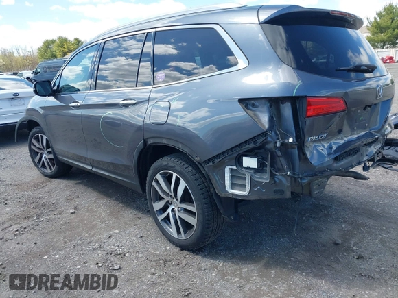 2016 Honda Pilot Elite with VIN 5FNYF6H06GB058392, listed as a IAAI auction lot 41983804 with 103,304 mi miles. Bid and sale history available at carsss.com. Image 3.