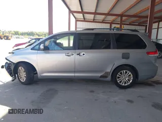 2013 Toyota Sienna XLE AAS with VIN 5TDYK3DC3DS297044, listed as a IAAI auction lot 42552470 with 143,947 mi miles and . Bid and sale history available at DreamBid. Image 14.