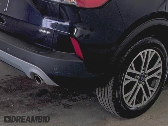 2021 Ford Escape SEL Hybrid with VIN 1FMCU9CZ0MUB25820, listed as a IAAI auction lot 42730204 with 66,443 mi miles and . Bid and sale history available at DreamBid. Image 7.