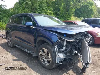 2021 Hyundai Santa Fe SE with VIN 5NMS1DAJXMH344025, listed as a IAAI auction lot 42477124 with 17,129 mi miles and . Bid and sale history available at DreamBid. Image 6.