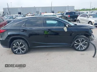 2018 Lexus RX 350 with VIN 2T2ZZMCA1JC103035, listed as a IAAI auction lot 42241695 with 104,382 mi miles and . Bid and sale history available at DreamBid. Image 14.