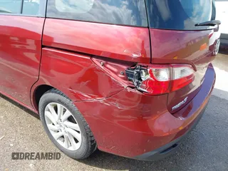 2012 Mazda 5 Sport with VIN JM1CW2BL9C0107471, listed as a IAAI auction lot 42021285 with 104,851 mi miles. Bid and sale history available at carsss.com. Image 6.