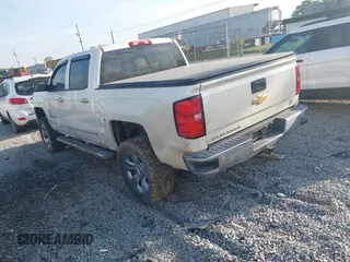 2014 Chevrolet Silverado 1500 LTZ with VIN 3GCUKSEC7EG281632, listed as a IAAI auction lot 42064565 with 178,957 mi miles. Bid and sale history available at carsss.com. Image 3.