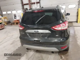 2015 Ford Escape SE with VIN 1FMCU9G9XFUA70029, listed as a IAAI auction lot 41673827 with 82,043 mi miles. Bid and sale history available at carsss.com. Image 17.