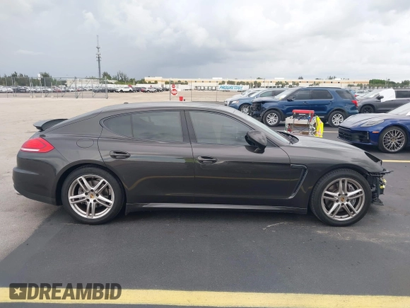 2015 Porsche Panamera 4 с VIN WP0AA2A71FL002436, выставлен на аукционе IAAI как лот 42479904 с пробегом 64 750 миль миль и . История ставок и продаж доступна на DreamBid. Изображение 14.