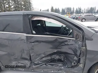 2018 Chevrolet Sonic LT z VIN 1G1JD6SB4J4106822, wystawiony jako IAAI lot #41591103 z przebiegiem 74 497 mil mil oraz . Historia ofert i sprzedaży dostępna na DreamBid. Obrazek 14.
