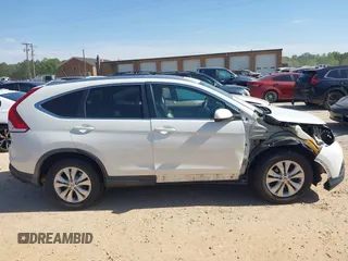2014 Honda CR-V EX-L with VIN 5J6RM4H77EL028656, listed as a IAAI auction lot 42022965 with 100,329 mi miles. Bid and sale history available at carsss.com. Image 13.