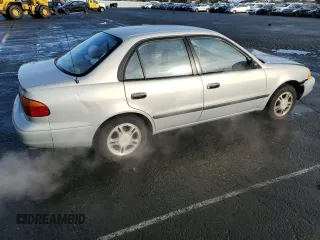 2002 Chevrolet Prizm z VIN 1Y1SK52842Z404089, wystawiony jako Copart lot #49103545 z przebiegiem 134 794 mil mil oraz Szkoda całkowita • Salvage title. Historia ofert i sprzedaży dostępna na DreamBid. Obrazek 3.