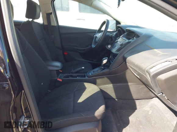 2016 Ford Focus SE with VIN 1FADP3FE7GL202284, listed as a IAAI auction lot 42014457 with 130,000 mi miles. Bid and sale history available at carsss.com. Image 5.