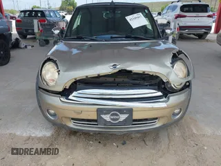2010 MINI Convertible with VIN WMWMR3C52ATU97825, listed as a IAAI auction lot 42349417 with 64,045 mi miles and . Bid and sale history available at DreamBid. Image 6.
