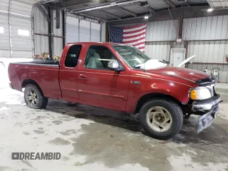 2000 Ford F-150 XL with VIN 1FTZX1720YKB22051, listed as a Copart auction lot 88255005 with 243,759 mi miles and Salvage Title. Bid and sale history available at carsss.com. Image 4.