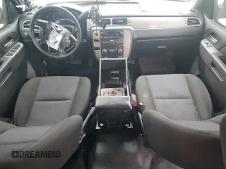 2014 Chevrolet Tahoe Commercial with VIN 1GNLC2E08ER209599, listed as a Copart auction lot 51018165 with 111,585 mi miles and Salvage title. Bid and sale history available at DreamBid. Image 8.