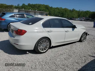 2012 BMW 3 Series 328i with VIN WBA3A5C57CF257346, listed as a Copart auction lot 53744705 with 118,242 mi miles and Salvage title. Bid and sale history available at DreamBid. Image 3.
