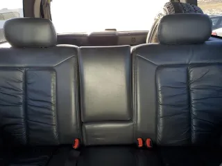 1998 Jeep Grand Cherokee Limited with VIN 1J4GZ88Z9WC180182, listed as a Copart auction lot 88602465 with 266,008 mi miles and Clean Title. Bid and sale history available at carsss.com. Image 10.