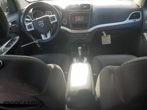 2014 Dodge Journey American Value with VIN 3C4PDCABXET277897, listed as a Copart auction lot 60566735 with 113,343 mi miles and Salvage title. Bid and sale history available at DreamBid. Image 8.