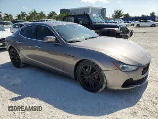 2014 Maserati Ghibli S Q4 z VIN ZAM57RTA6E1090293, wystawiony jako Copart lot #57298875 z przebiegiem 113 805 mil mil oraz Tytuł czysty. Historia ofert i sprzedaży dostępna na DreamBid. Obrazek 4.