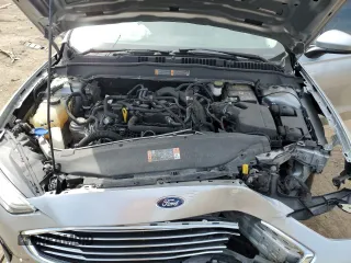 2020 Ford Fusion SE z VIN 3FA6P0HD1LR107923, wystawiony jako Copart lot #48995215 z przebiegiem 62 549 mil mil oraz Nie do naprawy • Non repairable. Historia ofert i sprzedaży dostępna na DreamBid. Obrazek 13.