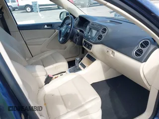 2012 Volkswagen Tiguan S with VIN WVGAV7AX9CW546724, listed as a IAAI auction lot 42831149 with 103,528 mi miles and . Bid and sale history available at DreamBid. Image 5.