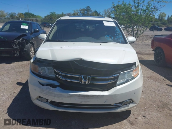 2015 Honda Odyssey Touring Elite with VIN 5FNRL5H96FB090702, listed as a IAAI auction lot 41825889 with 118,157 mi miles and . Bid and sale history available at DreamBid. Image 13.