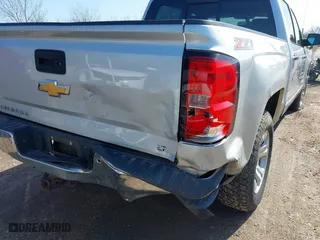 2015 Chevrolet Silverado 1500 LT with VIN 3GCUKREC0FG316716, listed as a IAAI auction lot 41908921 with 242,093 mi miles. Bid and sale history available at carsss.com. Image 17.