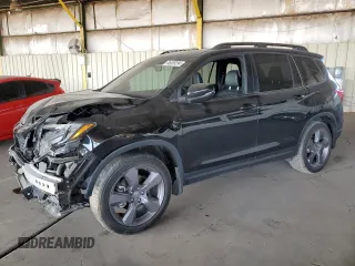 2020 Honda Passport Touring with VIN 5FNYF7H98LB002405, listed as a Copart auction lot 86009394 with 60,490 mi miles and Salvage Title. Bid and sale history available at DreamBid. Image 1.