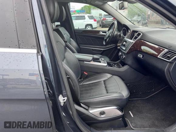 2013 Mercedes-Benz GL 450 z VIN 4JGDF7CE1DA247796, wystawiony jako Copart lot #59948105 z przebiegiem 133 542 mil mil oraz Czysty tytuł • Clean title. Historia ofert i sprzedaży dostępna na DreamBid. Obrazek 5.
