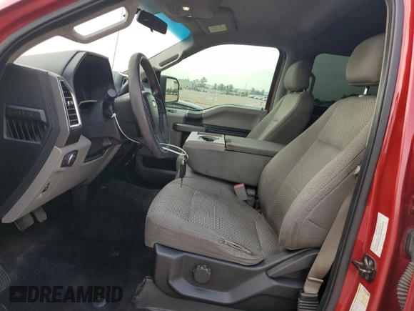 2016 Ford F-150 XLT with VIN 1FTEW1C86GKD79757, listed as a Copart auction lot 54757115 with 161,535 mi miles and Salvage title. Bid and sale history available at DreamBid. Image 7.