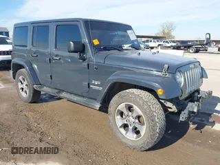 2017 Jeep Wrangler Unlimited Sahara z VIN 1C4BJWEG8HL535215, wystawiony jako IAAI lot #41342539 z przebiegiem 224 578 mil mil oraz . Historia ofert i sprzedaży dostępna na DreamBid. Obrazek 1.