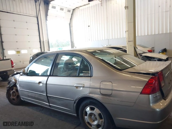2003 Honda Civic Hybrid with VIN JHMES95613S031198, listed as a IAAI auction lot 40508590 with 276,815 mi miles. Bid and sale history available at carsss.com. Image 14.